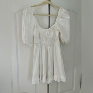 For love and lemons mini white dress.